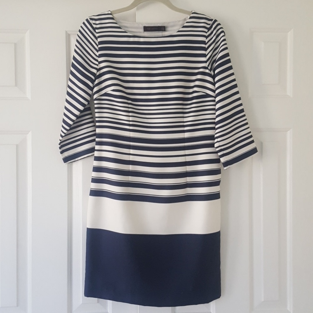 Navy and of white dress